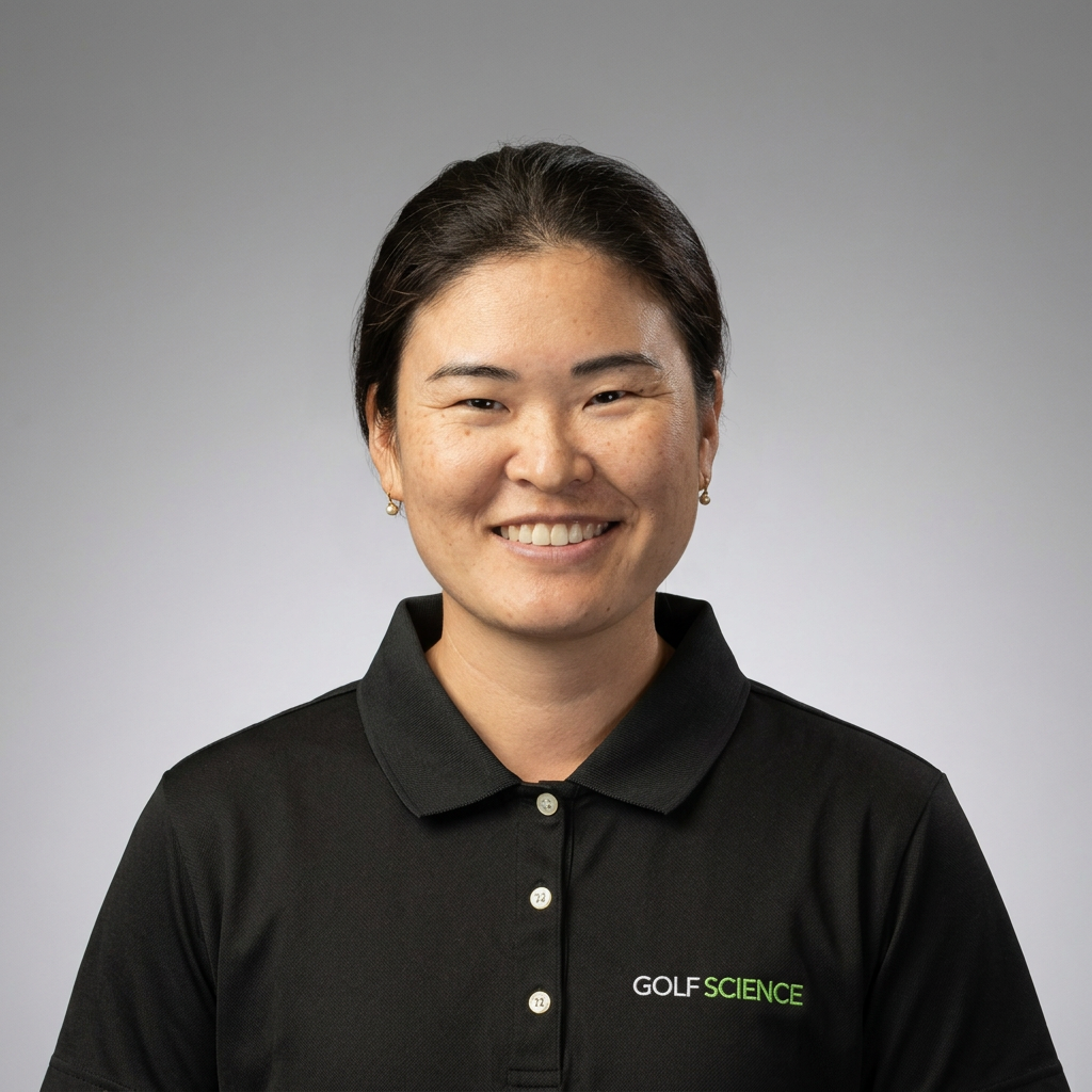 Chizuru Ueda, WPGA Tour Player, holding an iron at the driving range.